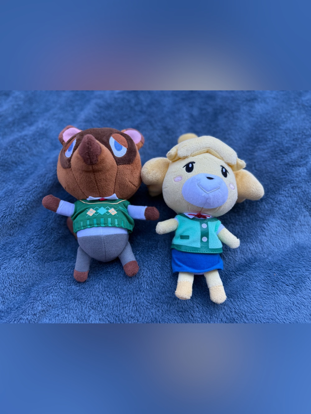 Tom Nook and Isabella from animal crossing stuffed animals